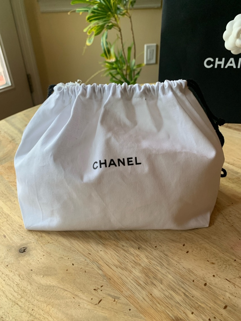 CHANEL White Drawstring Protective Pouch with Black Accents